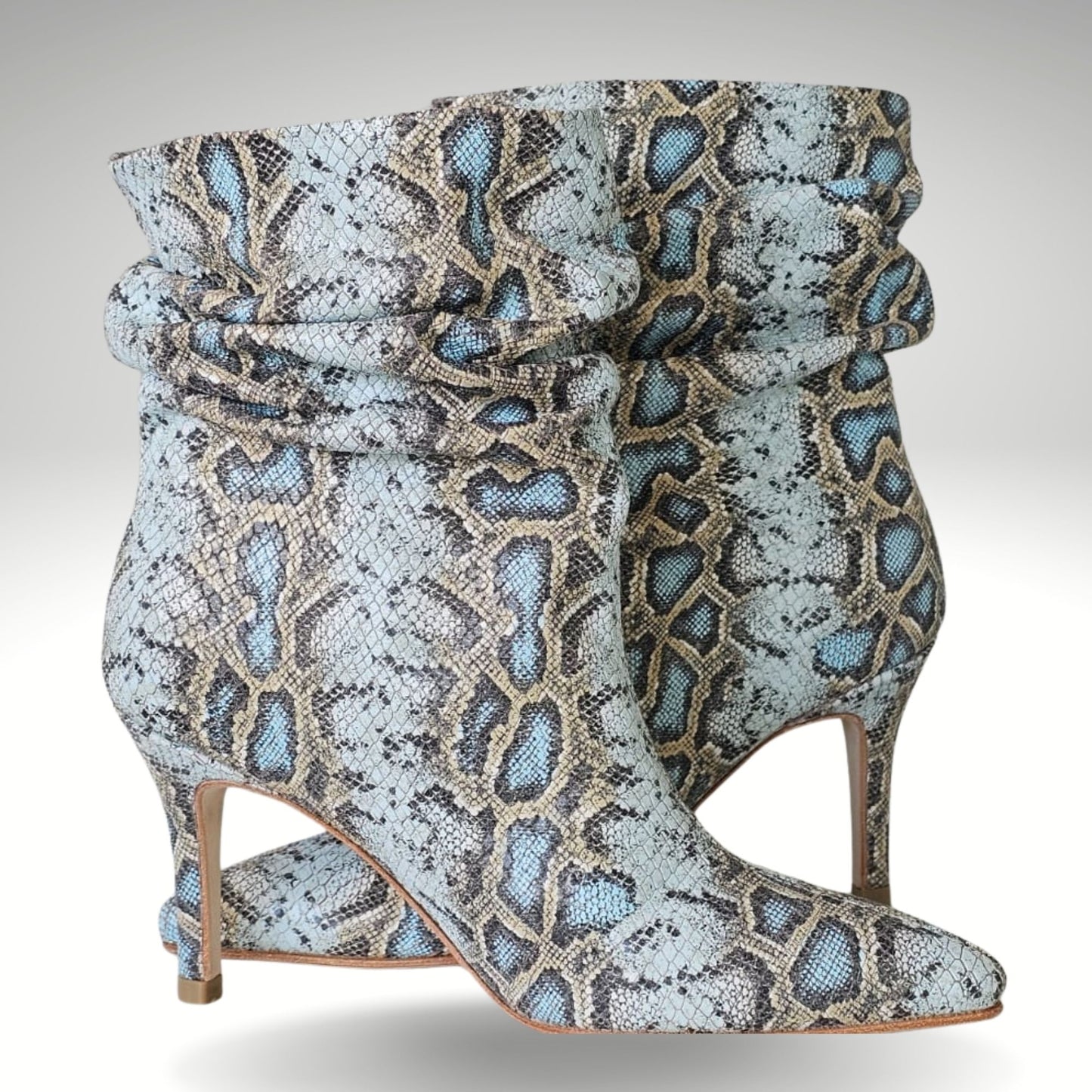 Botín Pitón Celeste Sauvage.